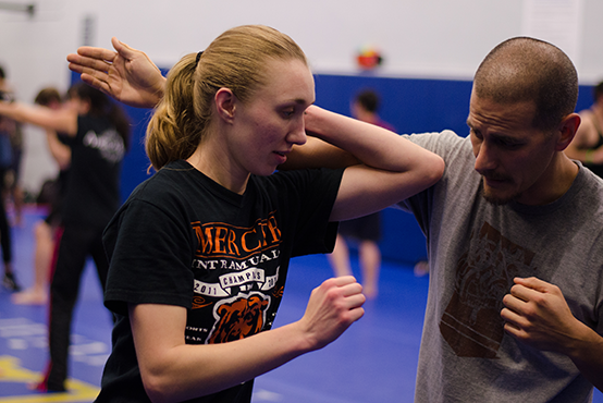 demonstrating self defense technique
