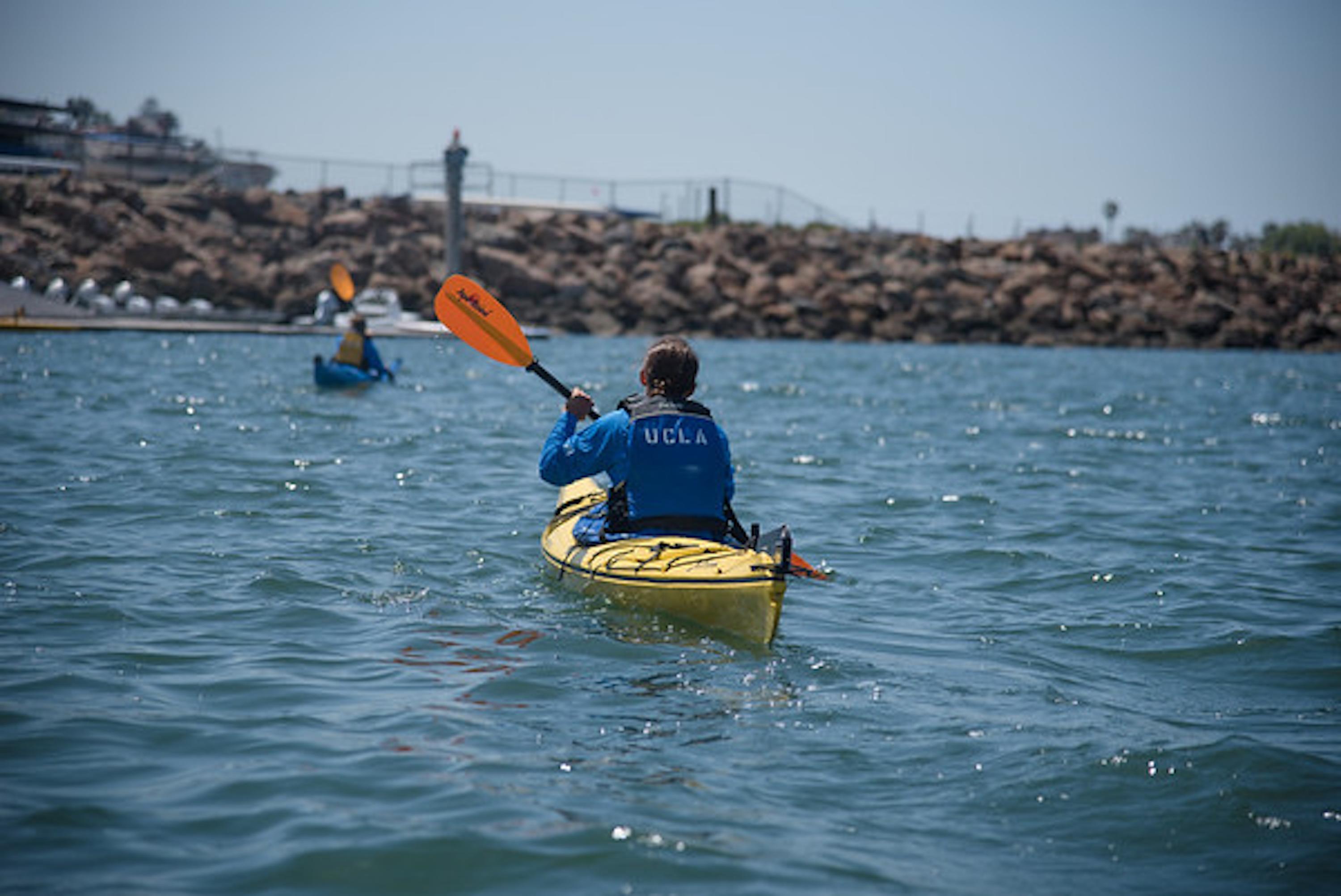 Image of person kayaking at MAC.