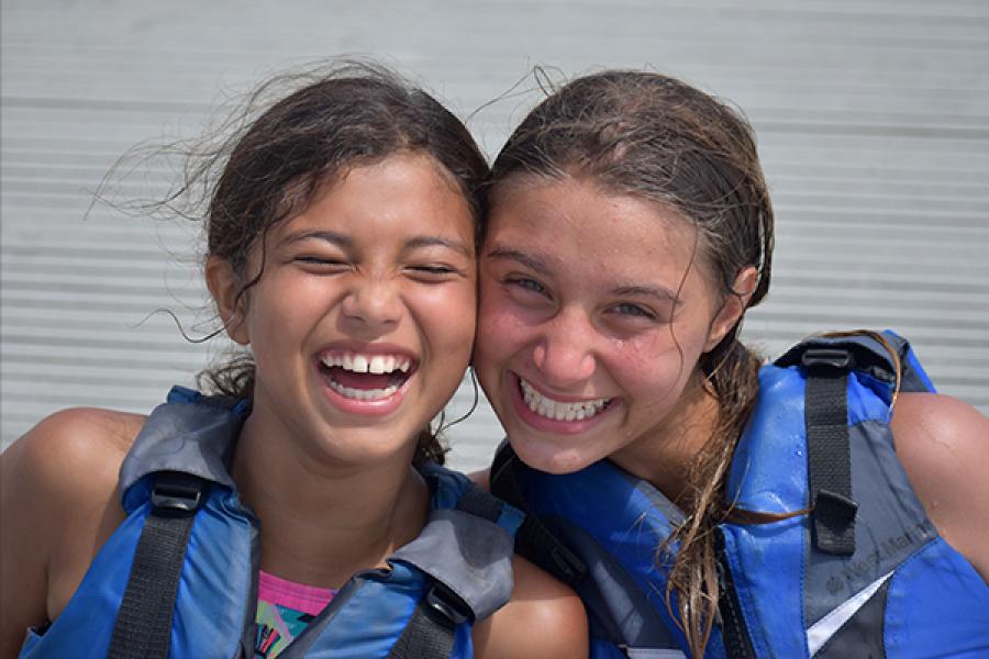 Two children at the MAC smiling