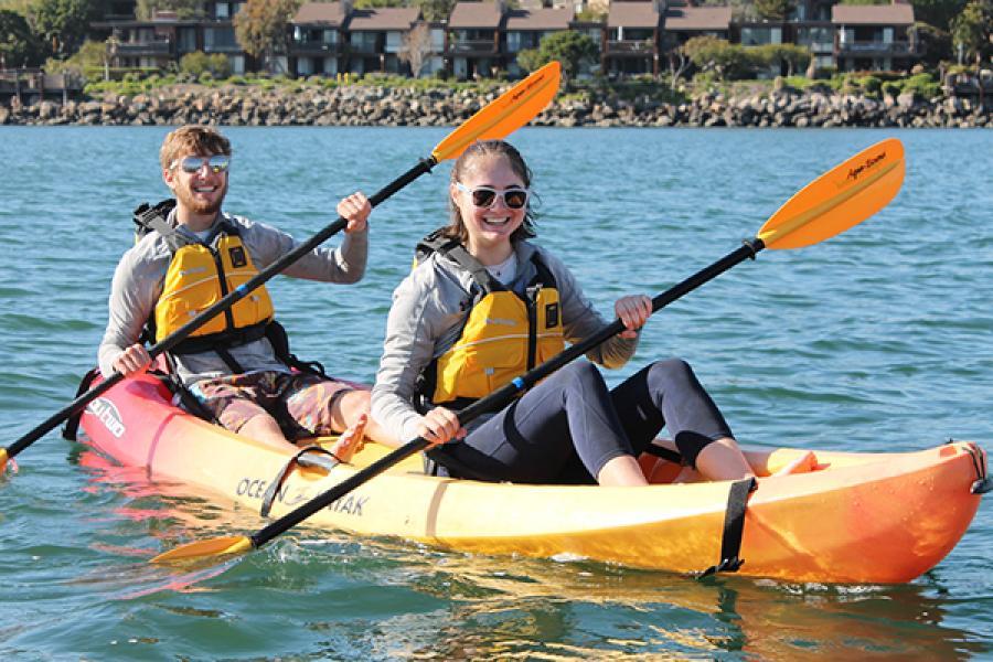 Two students paddling