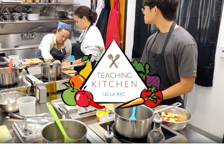 Photo of Chef Julia and two students preparing a friendsgiving meal in the Teaching Kitchen
