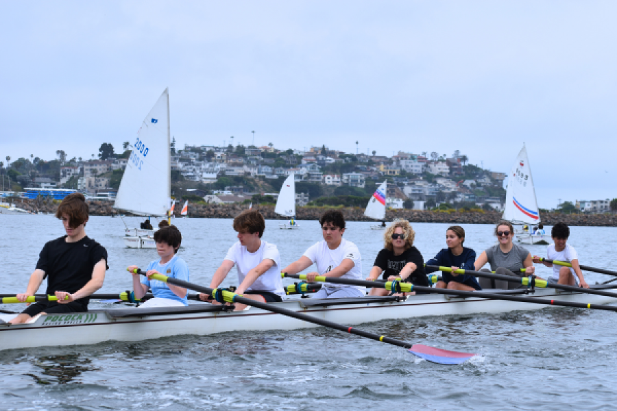 kids on rower out in the marina
