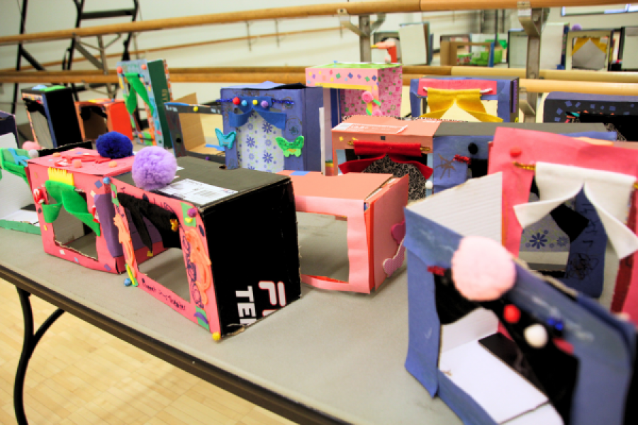 a photo of shoeboxes crafted to look like mini theater stages